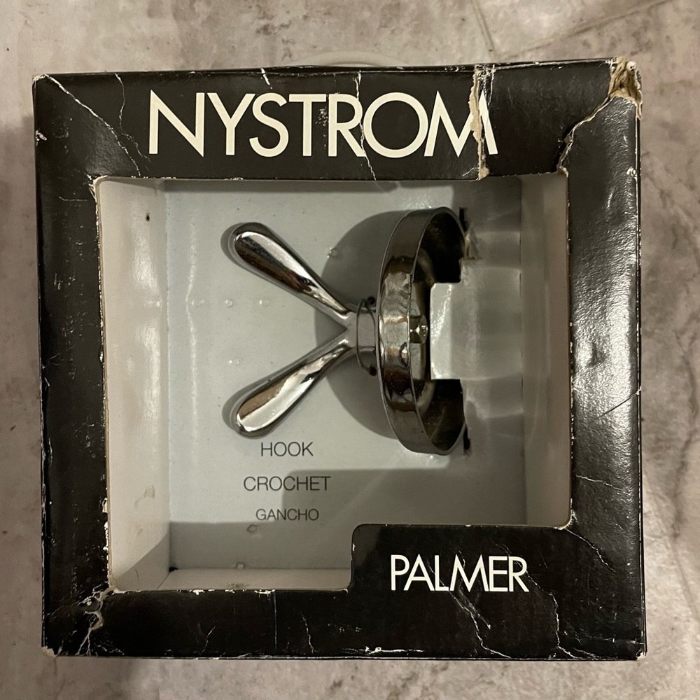 Nystrom silver hook with 2 hangers .NWT. Silver. Hook for towels, coats, clothes